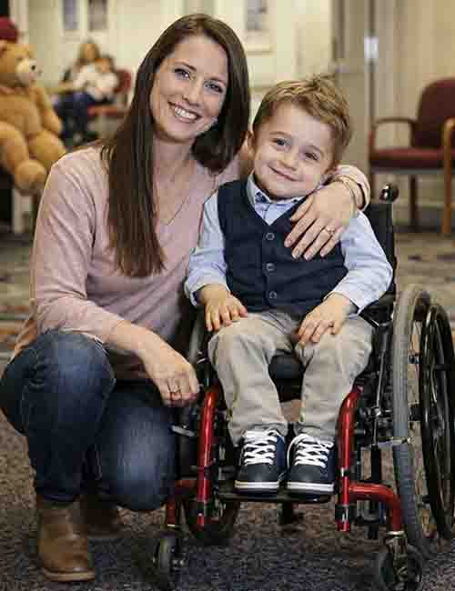 Lady with son with wheelchair